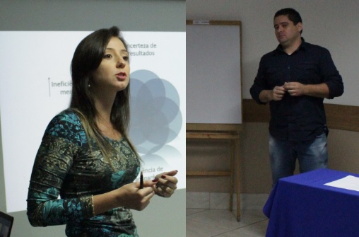 Karina e Marcelo apresentam trabalho sobre Metrologia Legal durante reunião gerencial. Foto: Lucas Gomes / Ipem-MG